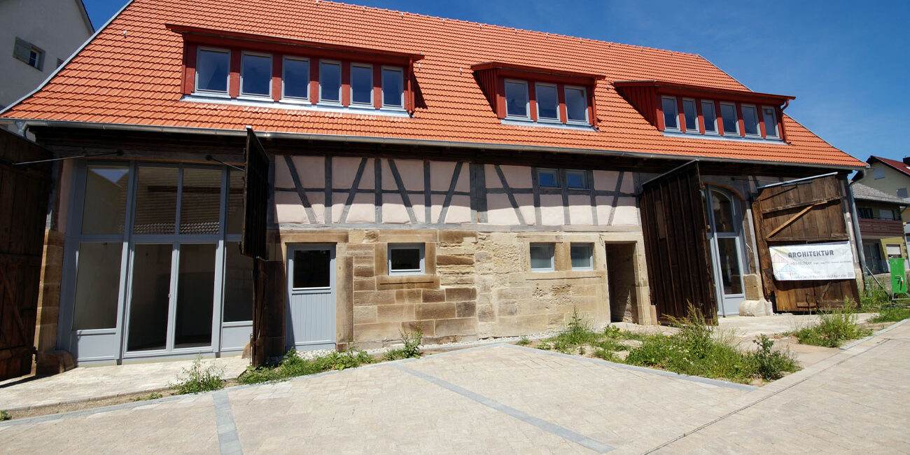 Sanierung einer denkmalgeschützten Scheune in ein Wohngebäude in Langenbrettach