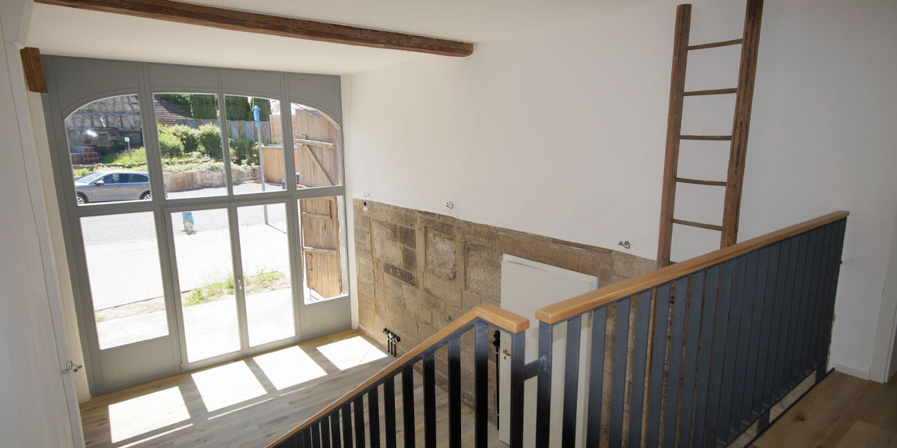 Sanierung einer denkmalgeschützten Scheune in ein Wohngebäude in Langenbrettach